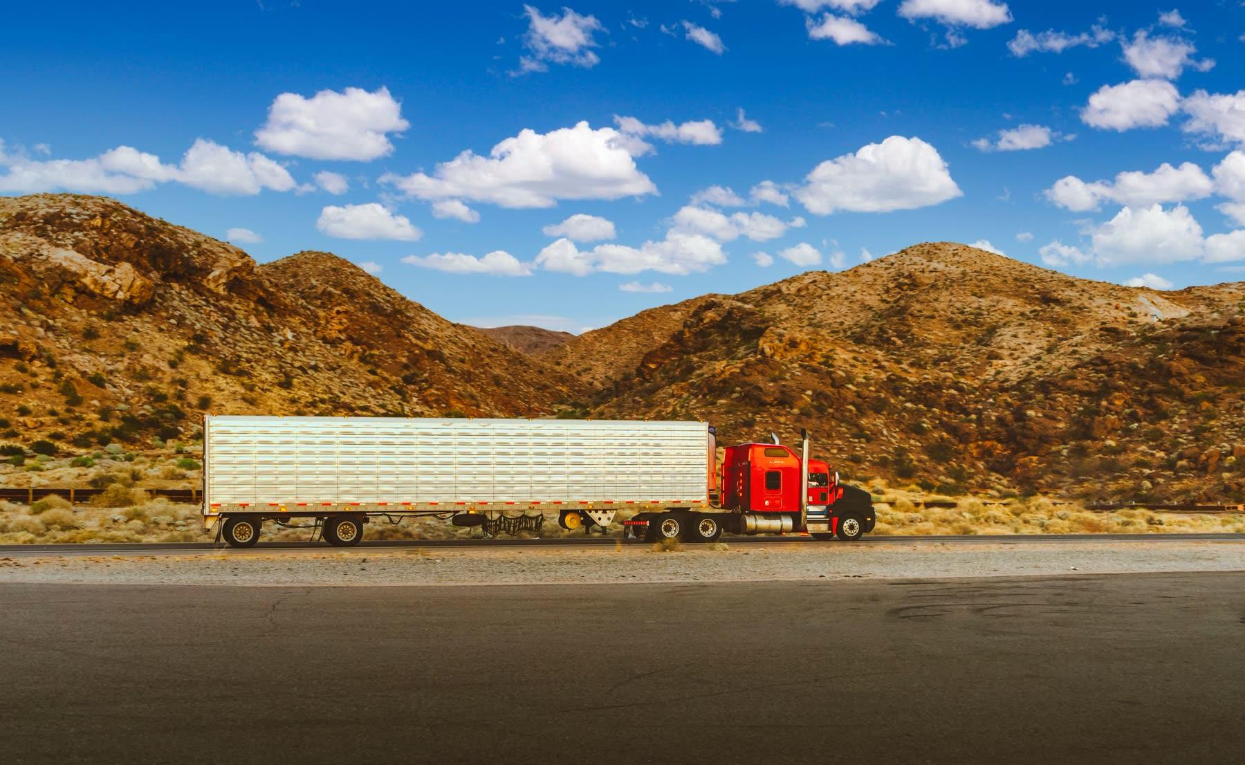 Tractor-trailer running a desert interstate
